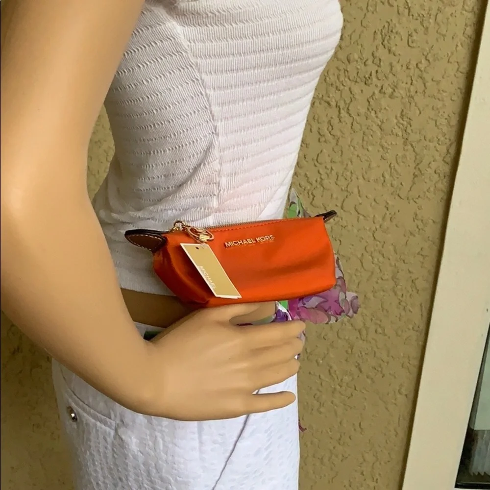 MICHAEL KORS TRAVEL XS POUCH TANGERINE - Picture 2 of 16